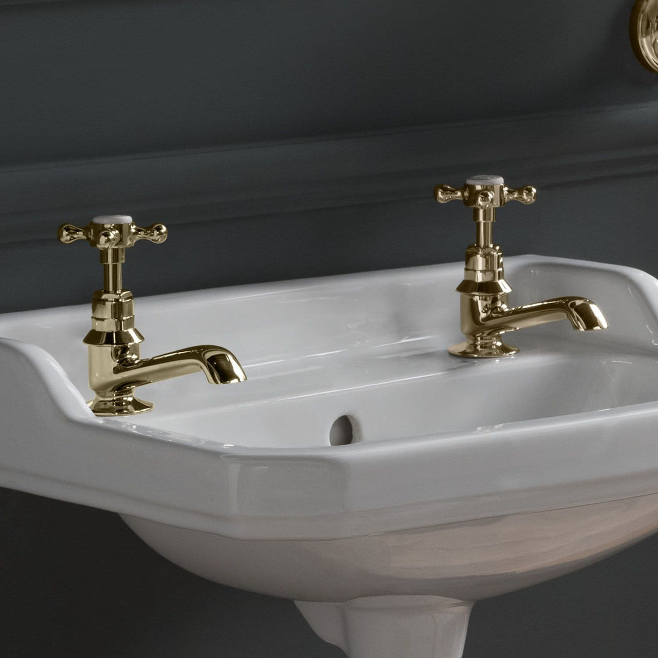 Pair of basin taps